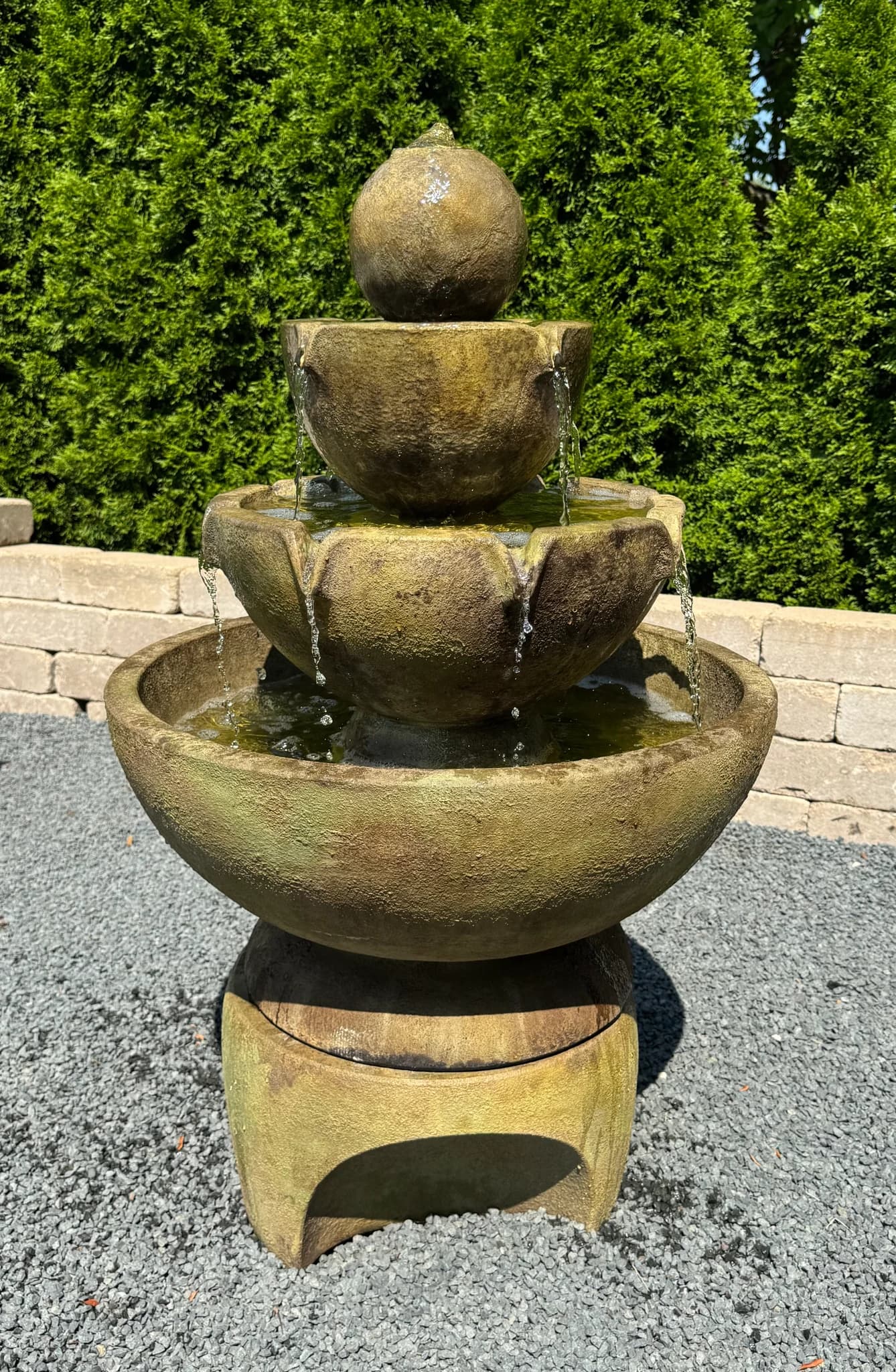Low Stone Vessels Fountain on Pedestal