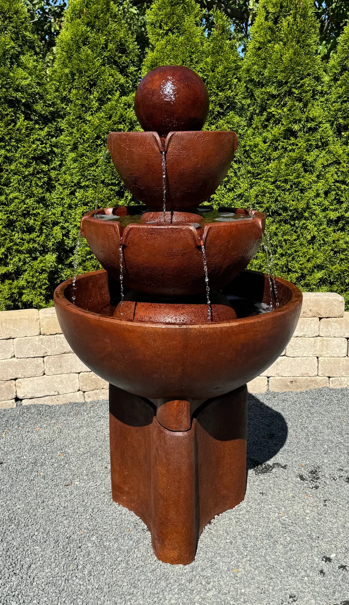 Tall Stone Vessels Fountain on Pedestal